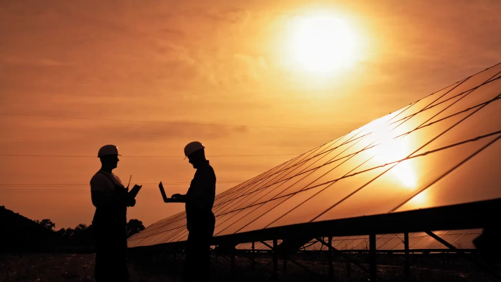 Labor Workers Setting Up Solar Panel Framework